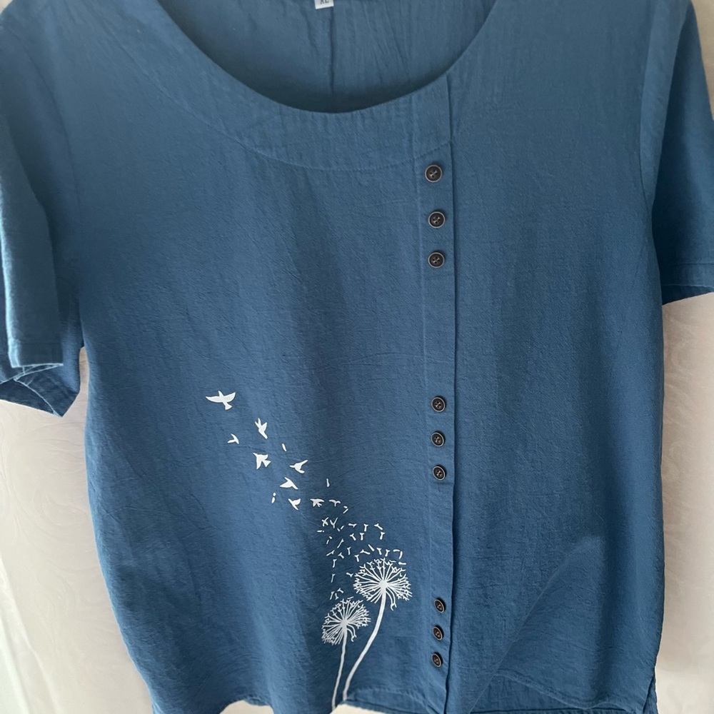100% cotton buttons just for accent short sleeve round neck